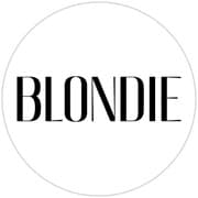 Logo design featuring the word "BLONDIE" in bold, stylized letters within a circular border.